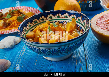 Moroccan cuisine, Chickpea Squash Tagine, Traditional assorted Moroccodishes, Top view. Stock Photo