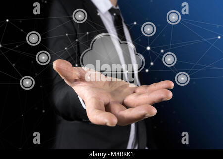Cloud in the hand of businessman. The concept of cloud service. Stock Photo