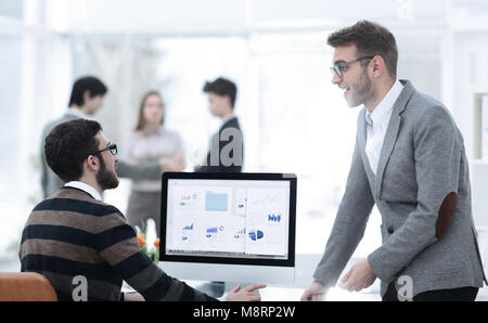 two businessmen analyzing stats financial data Stock Photo