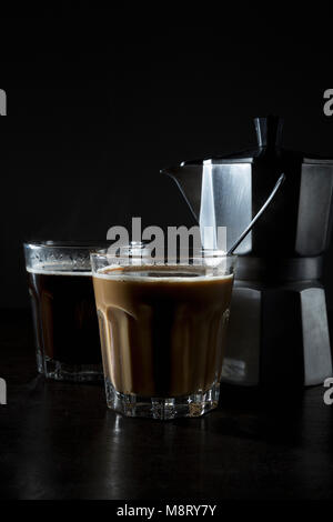 Close-up of coffee on table against black background Stock Photo