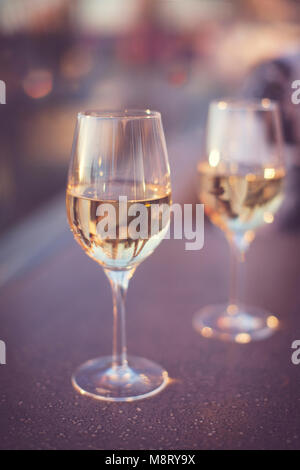 Close-up of white wine served on table