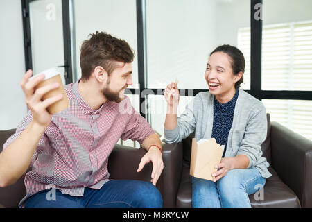 Office workers having fun on break Stock Photo