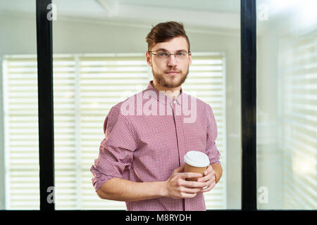 Confident male office worker Stock Photo
