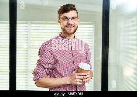 Young handsome manager at work Stock Photo