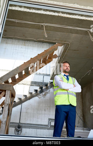Handsome Businessman on Construction Site Stock Photo