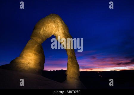 Sunset at Delicate Arch, located in Arches National Park, Utah. Stock Photo