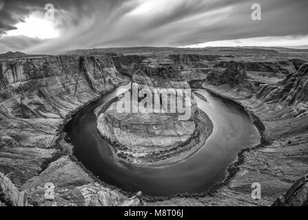 Black and white image of the Colorado River flowing through Horseshoe Bend near Page, Arizona. Stock Photo