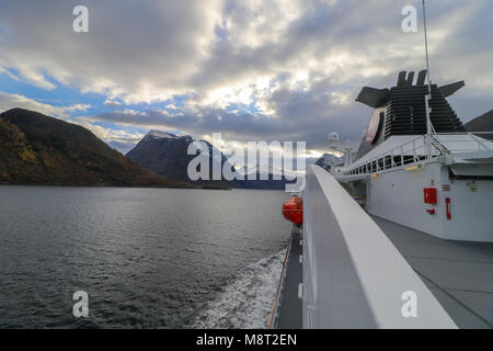 HJORUNDFJORDEN,NORWAY - OCTOBER 24th,2017: The Hurtigruten-ship 'Ms Polarlys in the beautiful Hjorundfjorden fjord in More and Romsdal county, Norway. Stock Photo