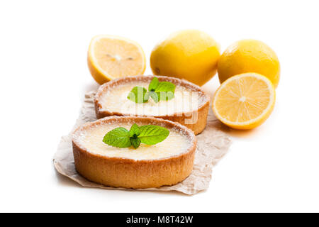 Mini  lemon tarts isolated on white Stock Photo