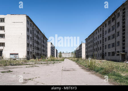 Desolate soviet apartment blocks in Skrunda, Latvia. Former dormitory district in the soviet military base in Skrunda 1, Latvia. Stock Photo