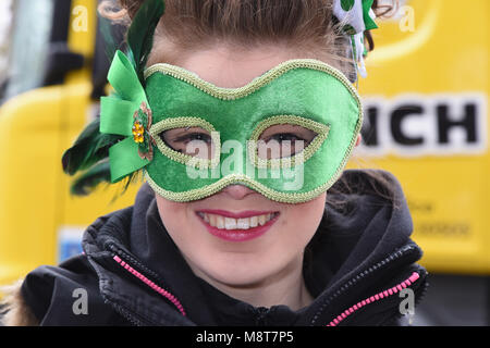 Young lady in a mask,St Patrick's Day Parade,Green Park,London.UK Stock Photo