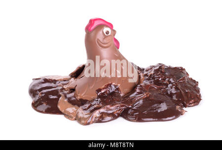 Melting chocolate easter chicken - Isolated on white background Stock Photo