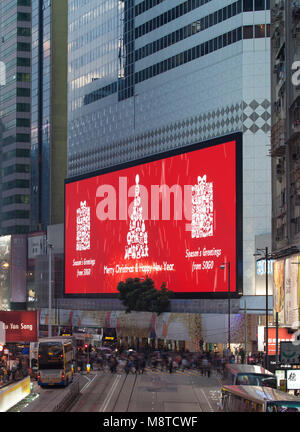 Screen displaying Christmas greetings. Sogo Mall, Hong Kong, Hong Kong. Architect: Mitsubishi Electric, 2017. Stock Photo