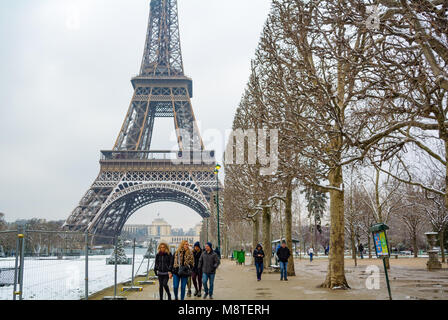 Tourists visiting eiffel tower with snow, paris, france Stock Photo