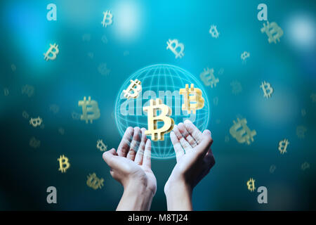 People hand holding virtual system bitcoin. Blockchain technology concept Stock Photo