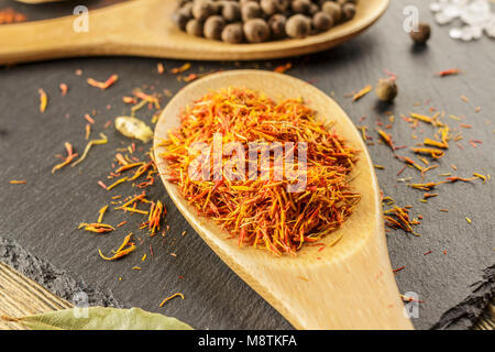 Dried saffron, seasoning. Kitchen mess, cooking. Fragrant natural spices. Stock Photo