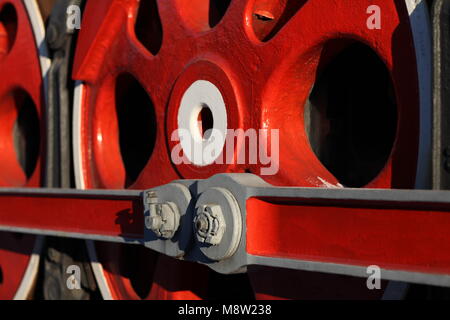 The wheels of the old steam locomotive, a fragment, close-up Stock Photo
