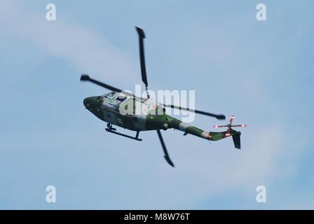 A Westland Lynx AH.7 helicopter of the British Army Air Corps (AAC) performs at the Airbourne airshow at Eastbourne, England on August 11, 2012. Stock Photo