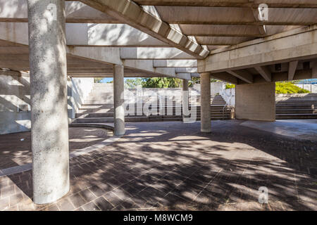 Canberra, Australia - March 12, 2018:  Shaded pathway under beautiful concrete architecture near High Court of Australia