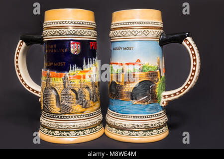 Prague, Czech Republic - February 25, 2018: Closeup of traditional Czech beer mugs on a colored background Stock Photo