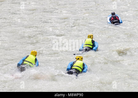 Group of people on river bugs in white water, active vacations, team concept Stock Photo