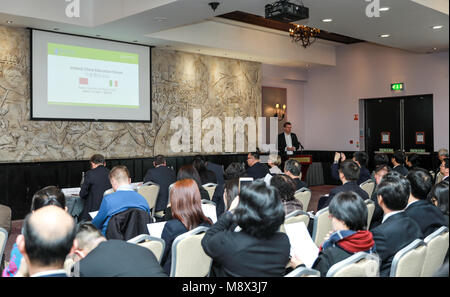 Dublin. 21st Mar, 2018. People take part in the Ireland-China Education Forum in Dublin, Ireland, on March 20, 2018. The high-level forum aimed at promoting the exchanges and cooperation between Chinese and Irish higher education institutions was held here on Tuesday. Over 100 delegates from top universities of both sides such as Peking University, Nanjing University, Trinity College Dublin and University College Dublin attended the one-day event. Credit: Xinhua/Alamy Live News Stock Photo