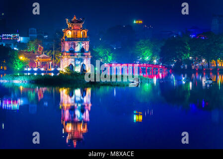 Hanoi Vietnam city, view at night of the old pavilion known as the Turtle (Tortoise) Tower sited in Hoan Kiem Lake in the centre of Hanoi, Vietnam.