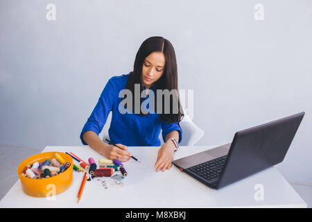 woman clothes designer working at home Stock Photo