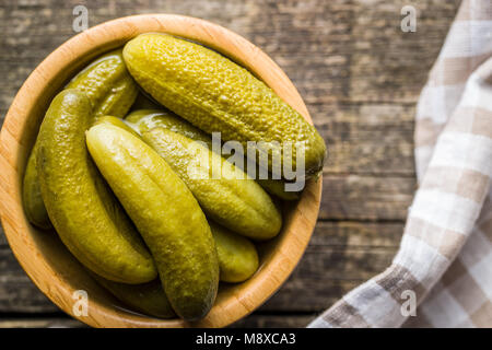 Pickles in bowl. Tasty preserved cucumbers. Stock Photo