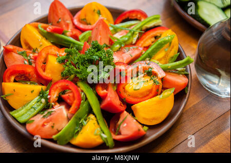 Multi-colored fresh cutted vegetables Stock Photo