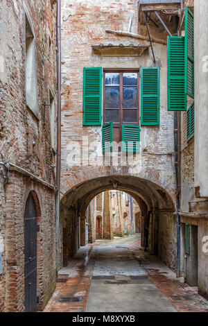 Back street with a vault in an Italian city Stock Photo
