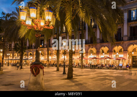 Lamp post designed by the famous Catalan architect Antoni Gaudi in Placa Reial square (Plaza Real), Gothic Quarter, Barcelona, Catalonia, Spain Stock Photo