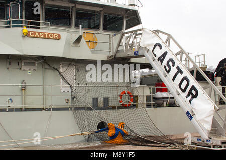 The superstructure and bridge of the Belgian navy ship Castor berthed at Kennedy Wharf in the city of Cork Harbour Ireland during a snow storm Stock Photo