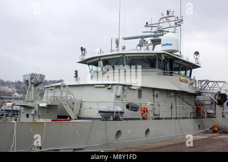 The superstructure and bridge of the Belgian navy ship Castor berthed at Kennedy Wharf in the city of Cork Harbour Ireland during a snow storm Stock Photo