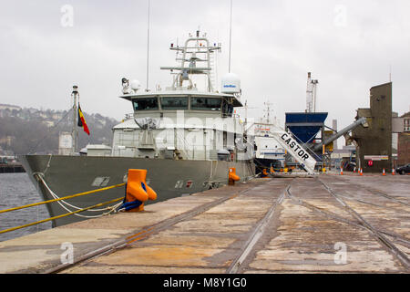 The superstructure and bridge of the Belgian navy ship Castor berthed at Kennedy Wharf in the city of Cork Harbour Ireland during a snow storm Stock Photo