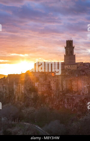 Sunset on the Tuscan city, Pitigliano, a large cliff side city built by stone. Stock Photo