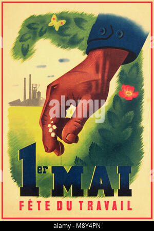 VICHY FRANCE 1st May FETE DU TRAVAIL Vintage French LABOR DAY 1ST MAY POSTER by- ROLAND HUGON The lily of the valley was associated with the Labor Day only under the Vichy government when, on April 24, 1941, Marshal Petain formally inaugurated May 1st as 'Labor and Social Concord'. This measure was intended to rally the workers to the French State WW2 Propaganda poster Vichy Government France Stock Photo
