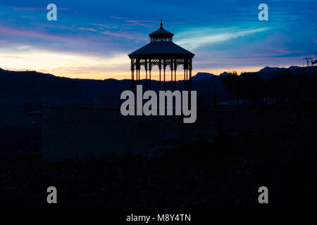 Sunset view of the Ronda Viewpoint (Mirador de Ronda) and the old pergola. Ronda, Spain