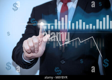 Businessman pressing button on virtual screen with diagram and cash. business concept Stock Photo