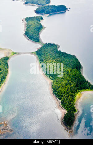 Aerial view of uninhabited areas of Alaska's forested coastline and islands. Stock Photo