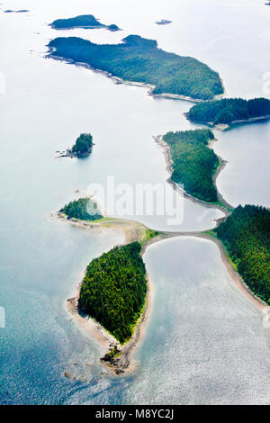 Aerial view of uninhabited areas of Alaska's forested coastline and islands. Stock Photo