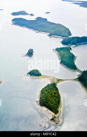 Aerial view of uninhabited areas of Alaska's forested coastline and islands. Stock Photo