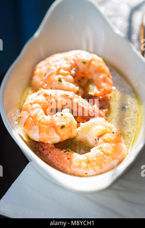 King prawns in white wine sauce Stock Photo