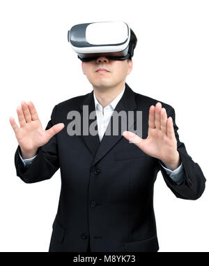 Close up of businessman in a formal wear and virtual reality glasses. Stock Photo