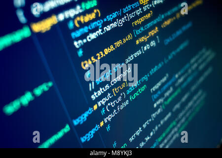Modern programming source code on a computer screen. Background Stock Photo