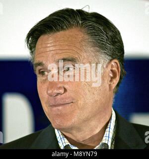 Former Massachusetts Governor Mitt Romney (L) kisses his wife Ann ...