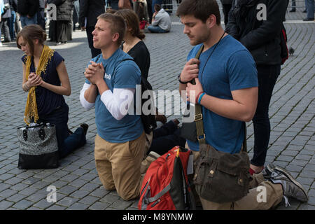 Vatican City. Faithfuls pray during Pope Francis inauguration mass at St Peter's square on March 19, 2013 at the Vatican. Stock Photo