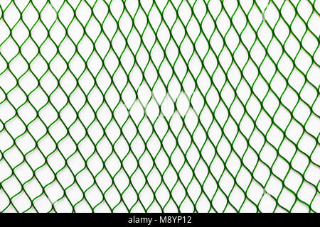 Green net placed vertically on the white soft background surface Stock Photo
