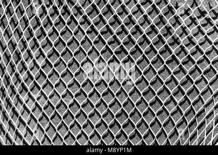 White net placed vertically on sponged grey background surface Stock Photo
