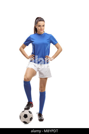 Full length portrait of a female soccer player isolated on white background Stock Photo